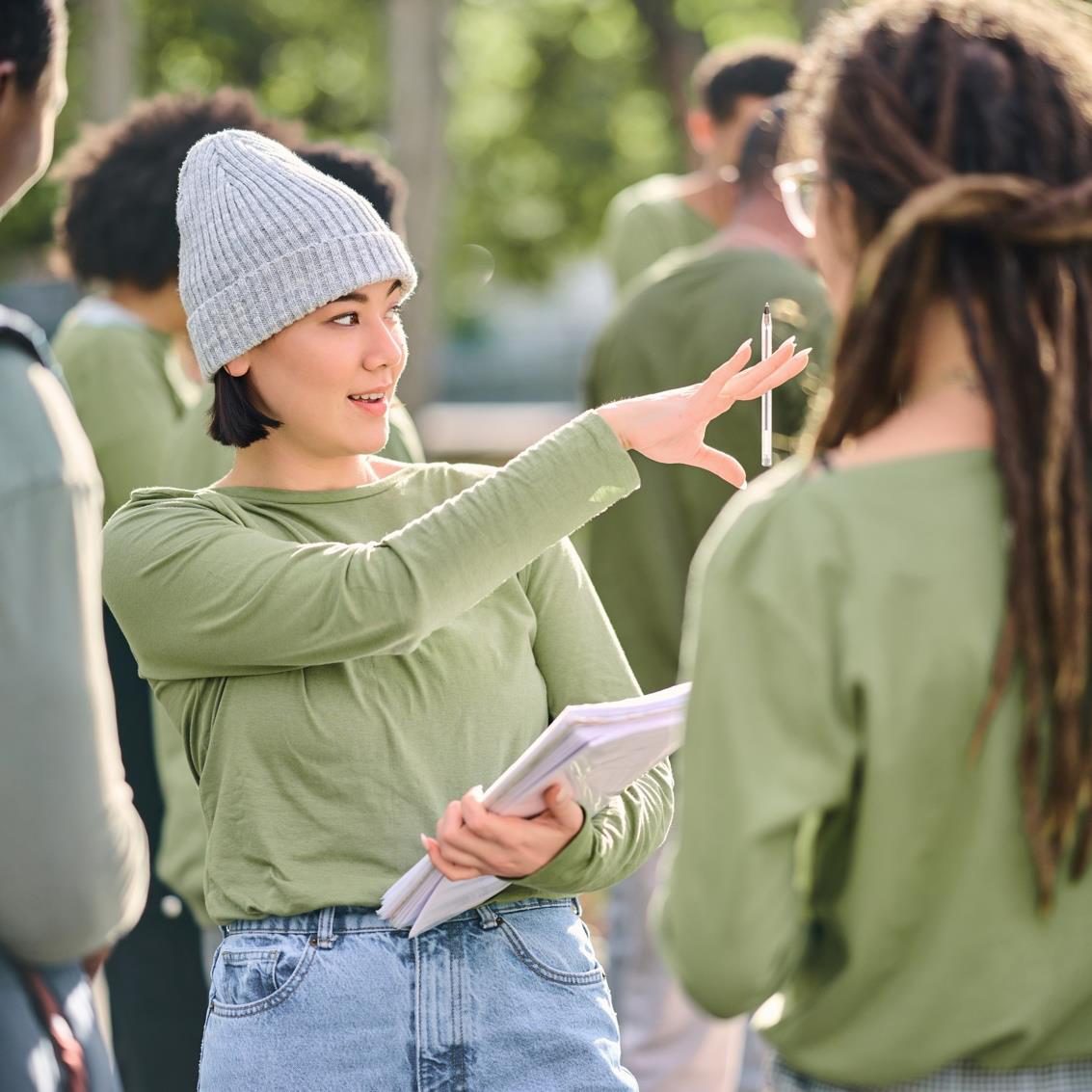 A field organizer briefing volunteers
